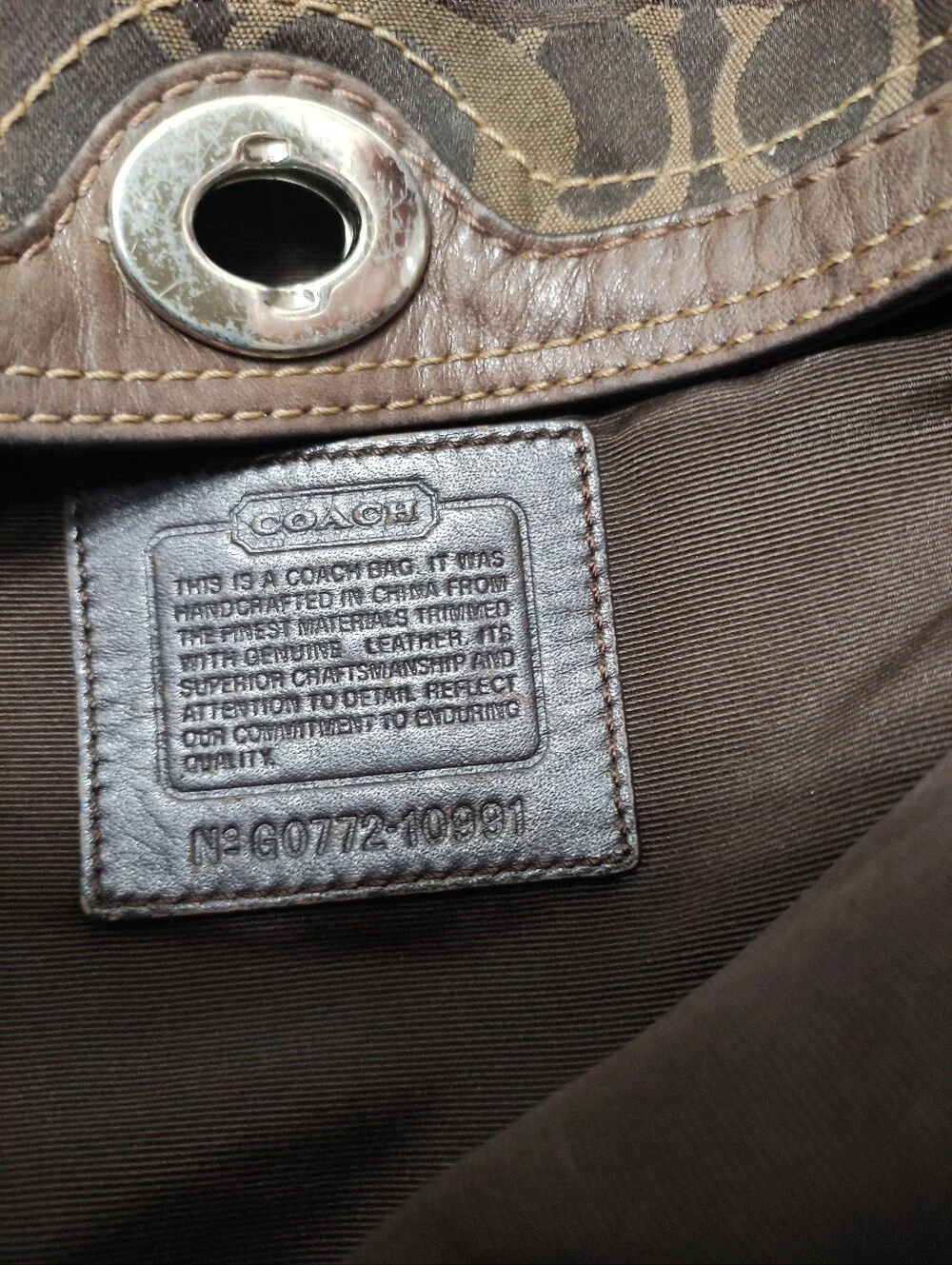 Coach signature fabric